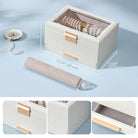 Close-up of the pull-out drawer on the Lolalet jewelry organizer, revealing compartments for rings, earrings, or other small accessories.