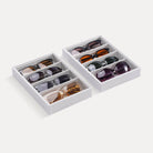 Lolalet 4-grid 2pcs velvet sunglasses organizer tray displayed on a dresser, neatly holding various styles of men's and women's eyewear.