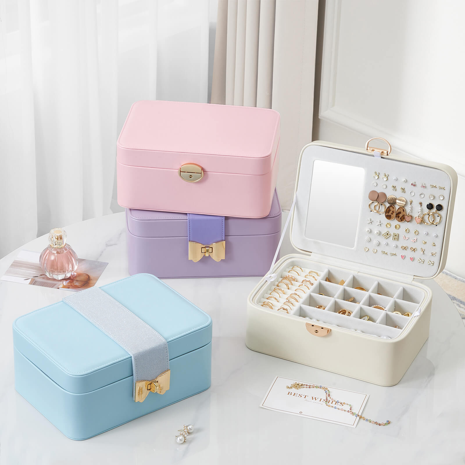 Front view of the 4Colors Lolalet 2-layer jewelry box, highlighting the elegant bow clasp.