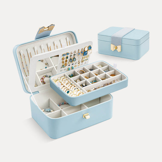 Blue open view of the Lolalet 2-layer jewelry organizer showing compartments for rings and earrings, and an interior mirror.