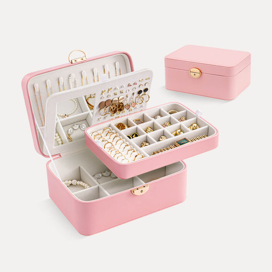 Pink open view of the Lolalet 2-layer jewelry organizer showing compartments for rings and earrings, and an interior mirror.