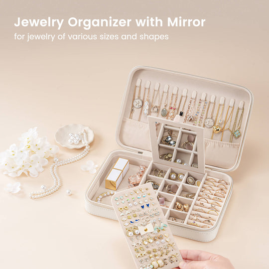The Lolalet travel jewelry case filled with necklaces, rings, and bracelets to demonstrate its large storage capacity for travel.