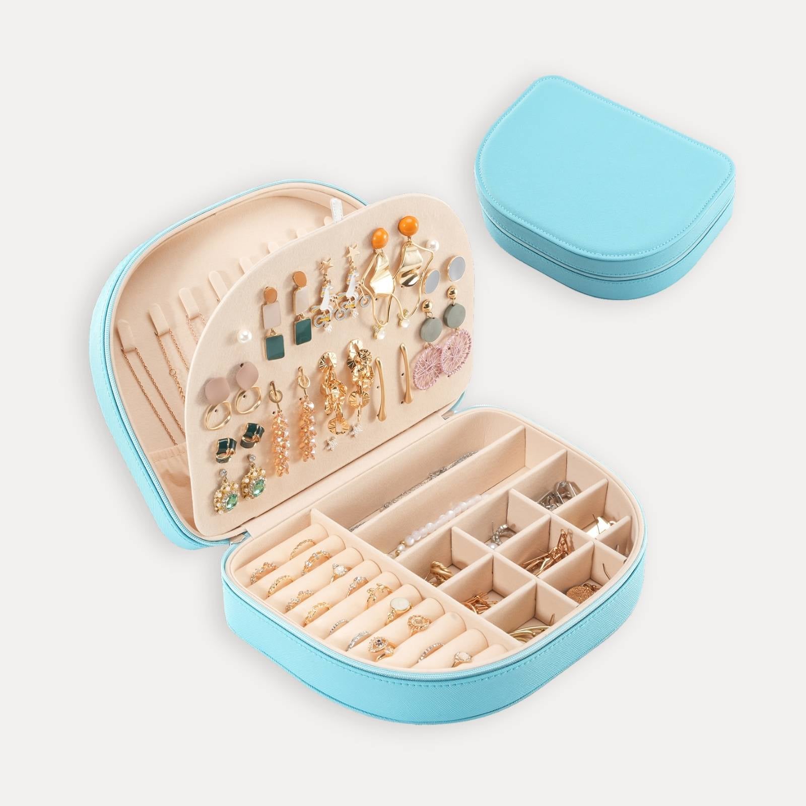 Pequeño estuche portátil para joyas con forma de concha marina 